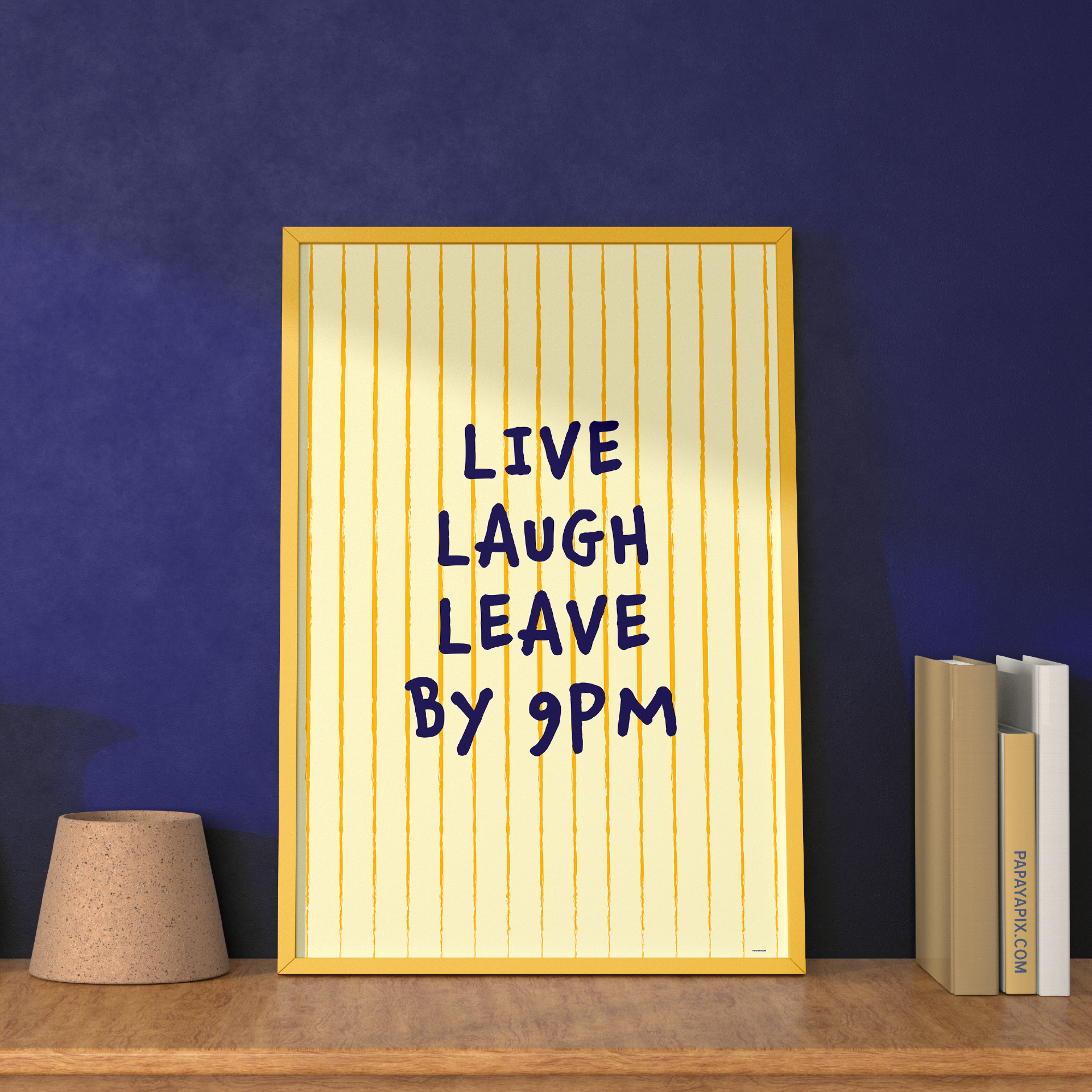 Large "Live, Laugh, Leave by 9 PM" Wall Art Print in yellow. Framed cute wall decor / entryway artwork next to some books, leaning against a blue wall.