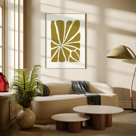 Large Geo Flower Wall Art Print in warm green. A modern botanical wall art design, framed and hanging on the wall of a stylish beige living room.