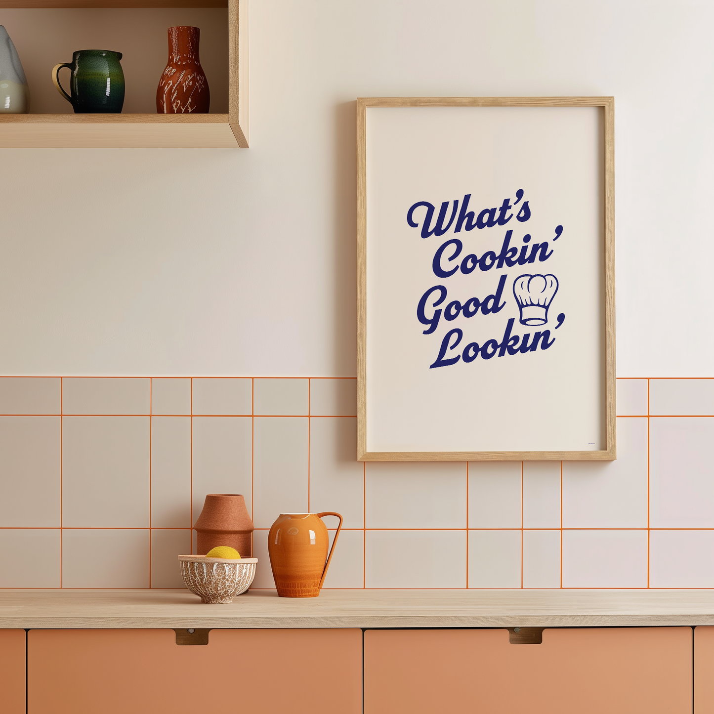 Medium "What's Cookin' Good Lookin'" Kitchen Wall Art Print in Blue on warm off-white background. Framed kitchen wall decor.